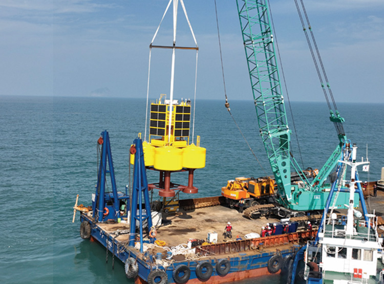 Offshore installation of buoys (using auxiliary tools)